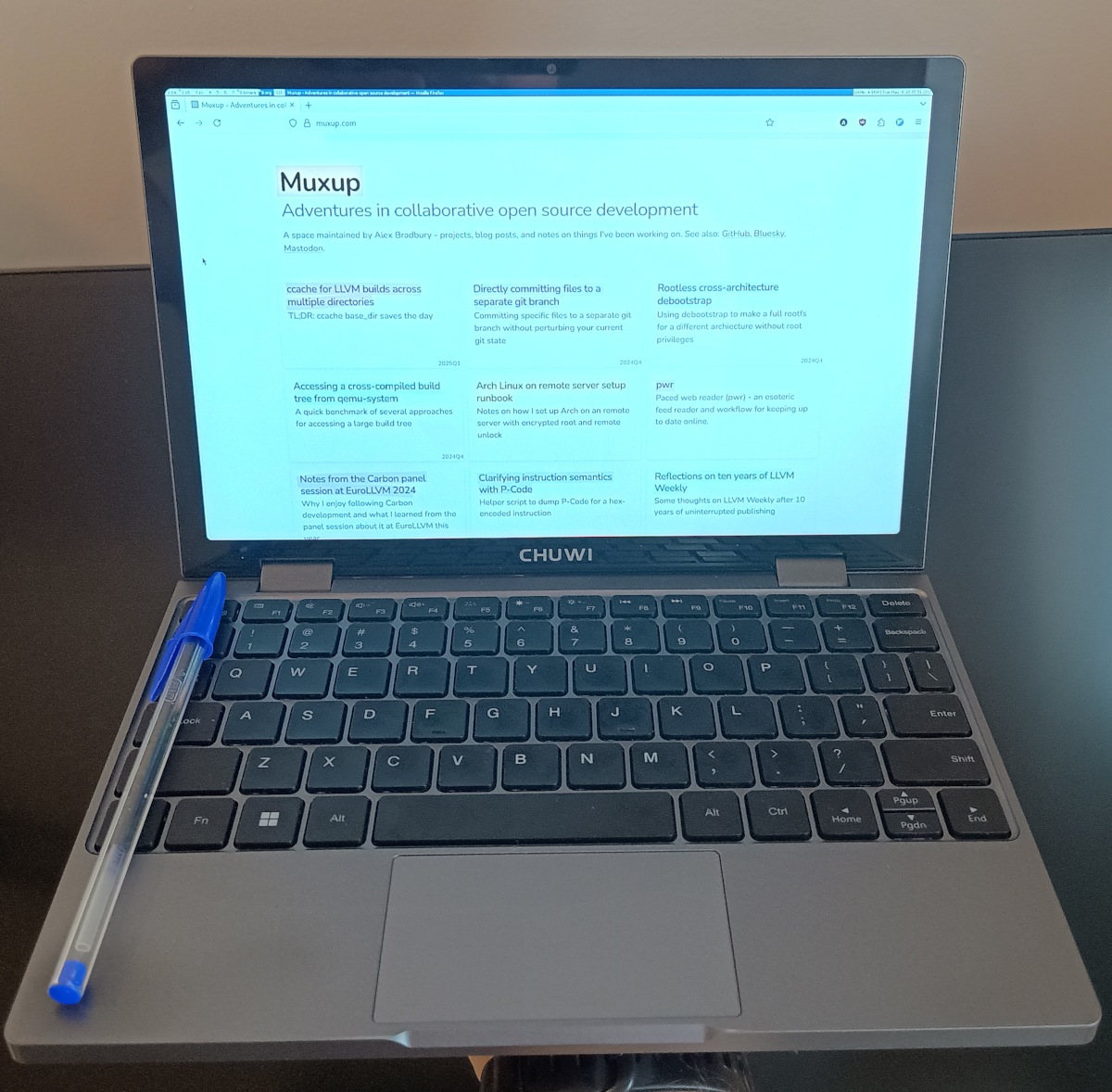 Picture of Chuwi MiniBook X N150 with a Biro for scale